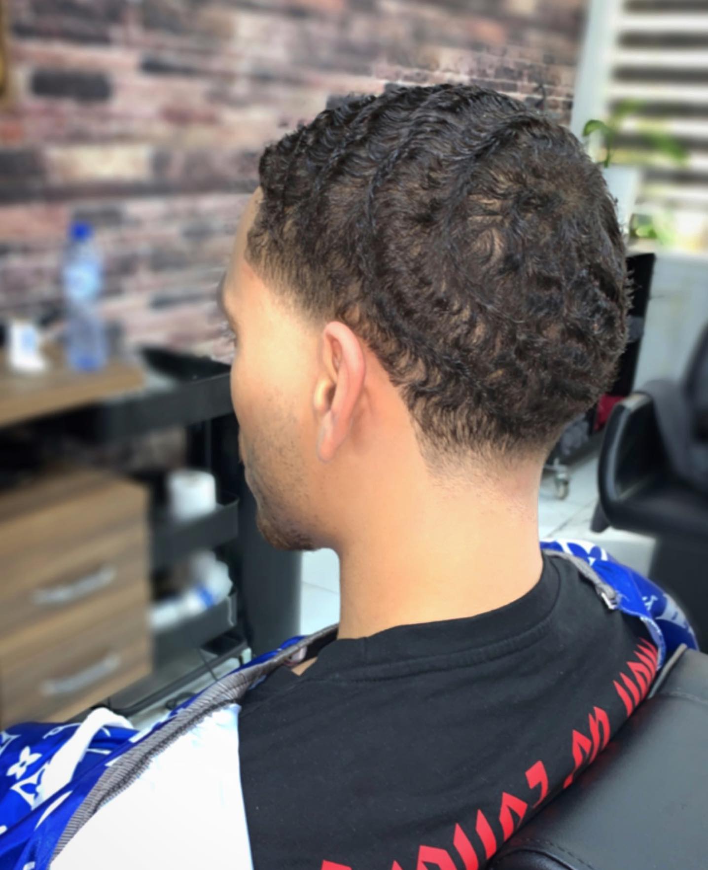 Krullen met een fade bij Alsafir